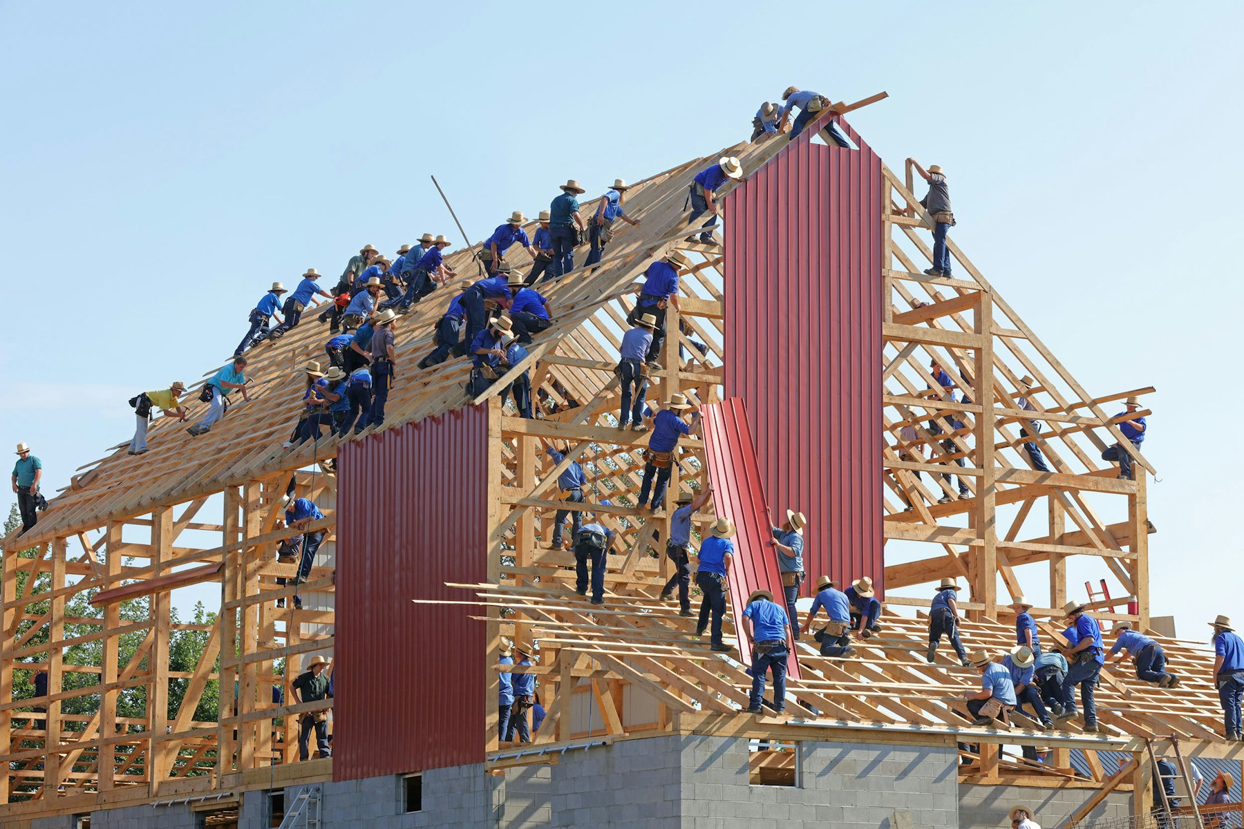 Workers framing a large residential construction project